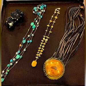 Costume jewelry 
3 necklaces and one bracelet